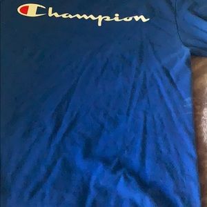 Blue shirt sleeves champion shirt.